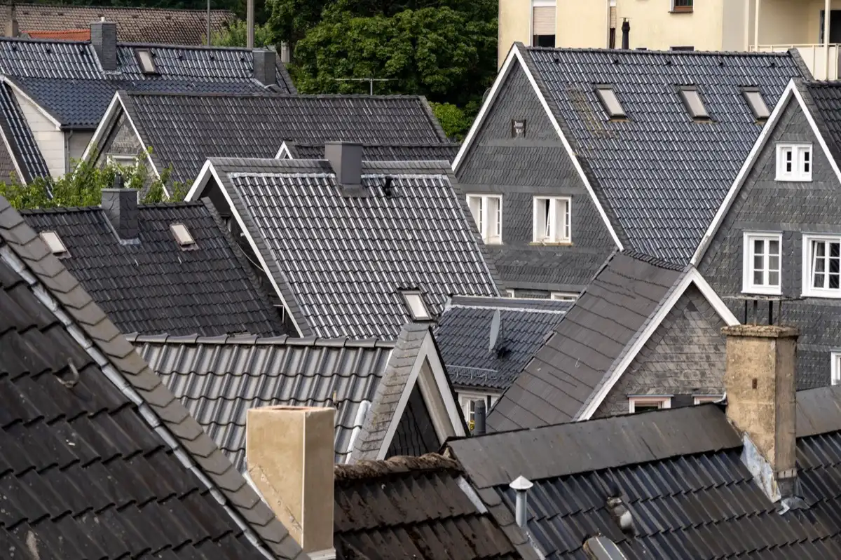 Steep roof eaves and gutter lines on houses in Fishers, IN